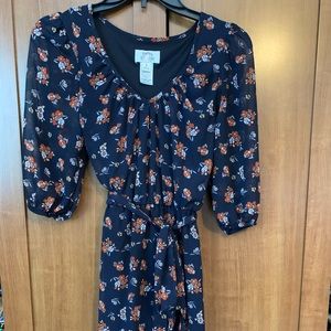 Navy blue dress with flower detail